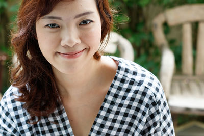 Portrait of smiling young woman