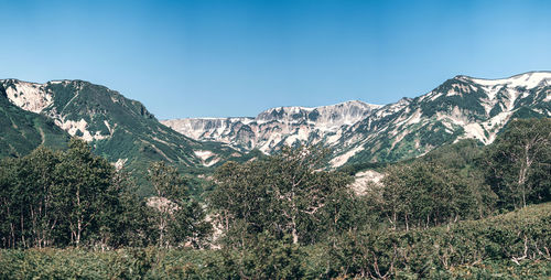 Scenic view of mountains against clear sky