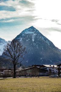 Scenic view of snowcapped mountains against sky