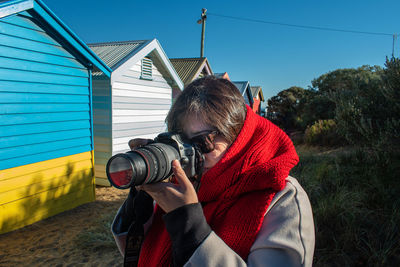 Man photographing with camera