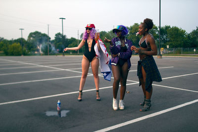 Young women standing on the ground