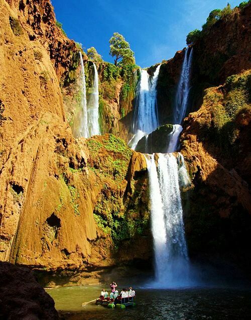 waterfall, water, scenics, tourism, social issues, travel destinations, blue, nature, vacations, travel, igniting, cliff, beauty in nature, long exposure, rock - object, river, stream - flowing water, tourist, motion, beauty, outdoors, day