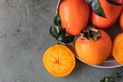 High angle view of orange fruits on table