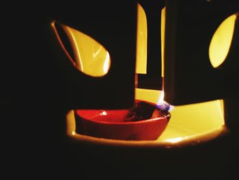 Close-up of illuminated candle