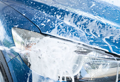 Close-up of frozen car