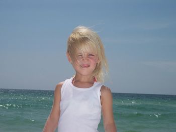 Portrait of young woman in sea