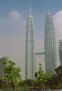 Low angle view of skyscrapers against sky