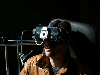 Close-up of man using virtual reality