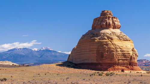 Rock formations against blue sky