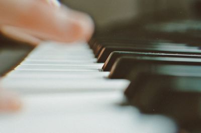 Blurred motion of person playing piano