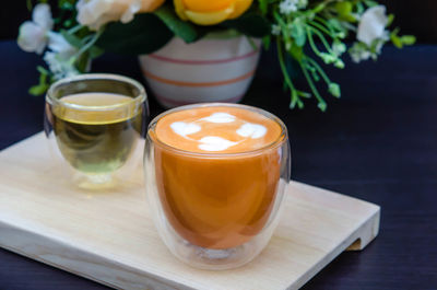 Close-up of coffee served on table