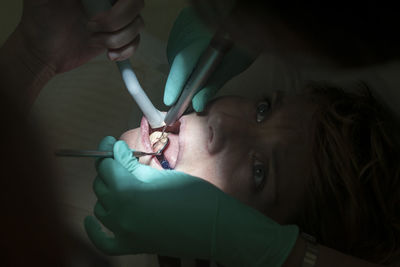 Close-up of dentist treatment to patient 