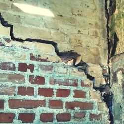 Low angle view of brick wall