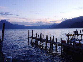 Scenic view of lake against cloudy sky