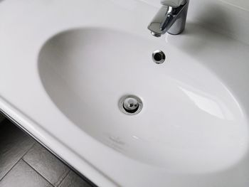 High angle view of faucet in bathroom