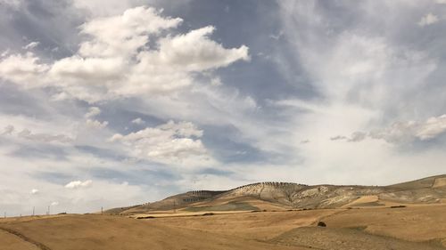 Scenic view of desert against sky