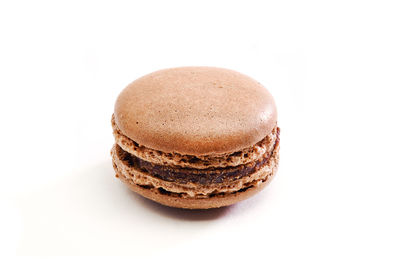 Close-up of chocolate cake against white background