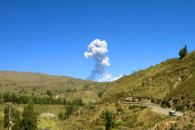 The eruption of sabancaya volcano in 2018 view from the peruvian altiplano in arequipa region, peru