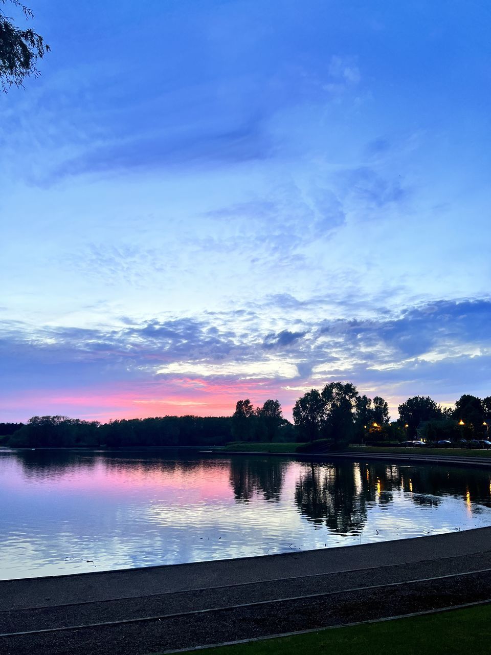 reflection, blue, water, nature, sky, cloud, sunlight, day, motion, light, outdoors, beauty in nature, no people, scenics - nature, sports, sea, transportation, wave, tree, travel, architecture, plant