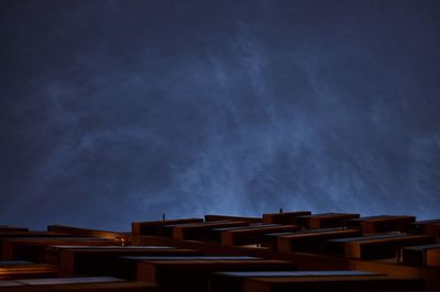 Panoramic view of city against sky at night