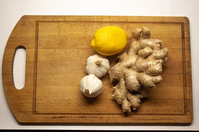 High angle view of fruits on cutting board