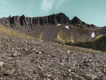 Scenic view of rocky mountains against sky