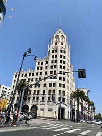 Low angle view of building against blue sky