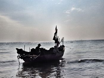 Boat sailing in sea