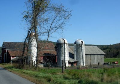 Houses against clear blue sky