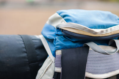 Close-up of backpack on field