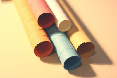 Close-up of colorful paper rolls on table