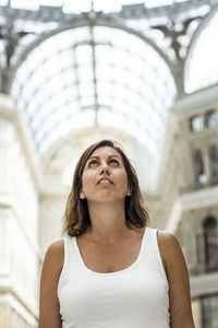 Close-up of woman looking up