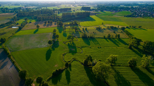 European countryside. an aerial view of the belgian countryside on a bright spring dusk evening
