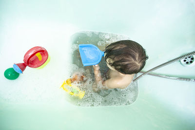 High angle view of girl in swimming pool