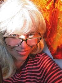 Close-up of young woman in sunglasses