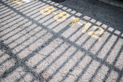 High angle view of text on road