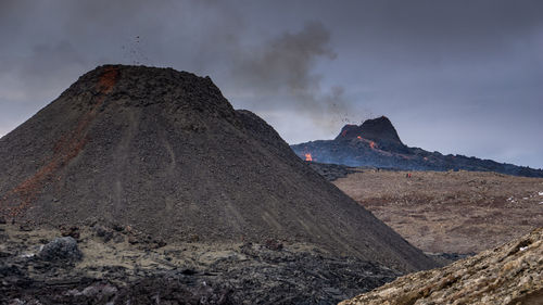 Panoramic view of volcanic mountain against sky