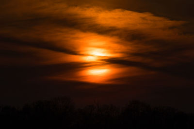 Scenic view of dramatic sky during sunset