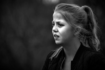 Close-up of girl looking away