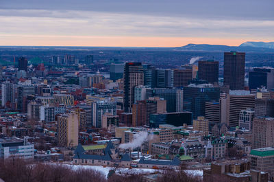 Aerial view of city at sunset