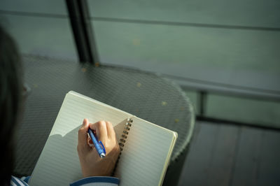 High angle view of book on table