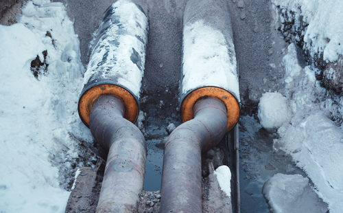 High angle view of old pipes during winter