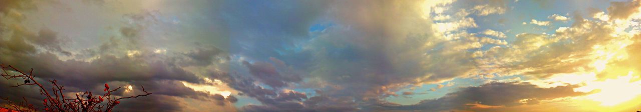 Low angle view of cloudy sky at sunset