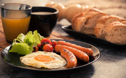 Close-up of breakfast served on table