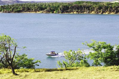 High angle view of boat sailing on river 