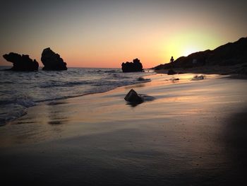 Scenic view of sea at sunset