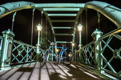 Interior of illuminated bridge at night