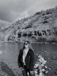 Portrait of woman standing in water