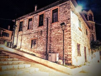 Buildings in city at night