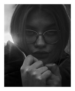 Portrait of woman wearing eyeglasses